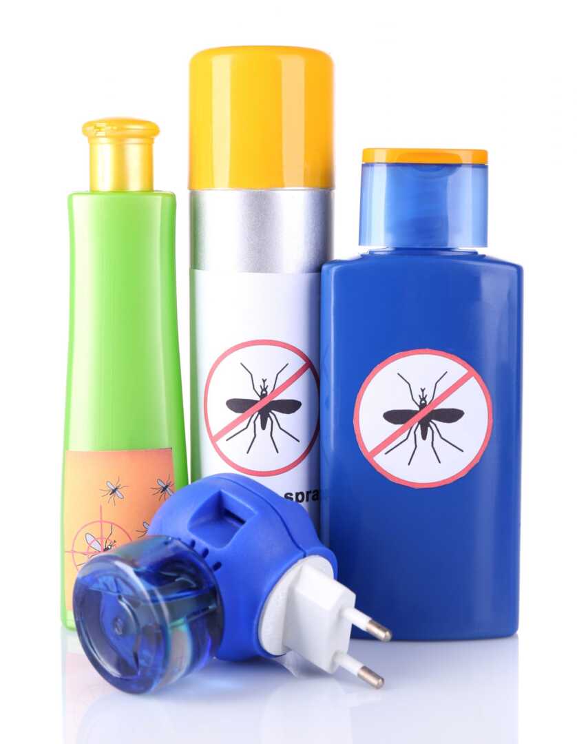 Bottles with mosquito repellent cream and fumigator, isolated